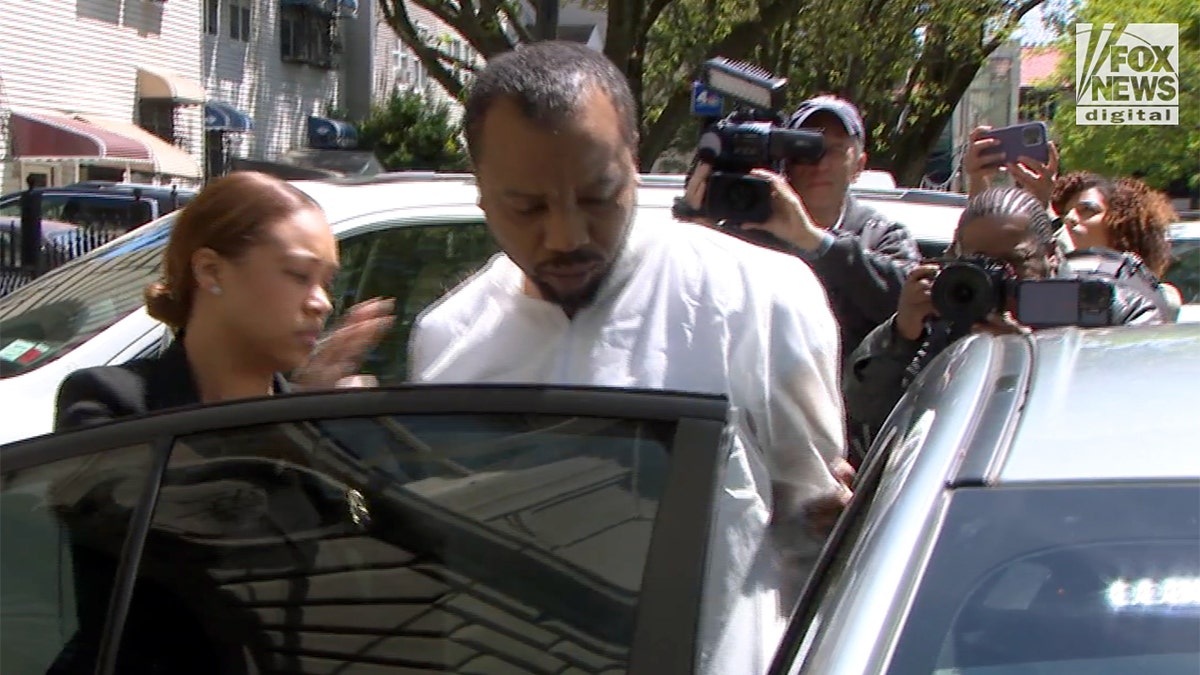 Kashaan Parks escorted into police vehicle