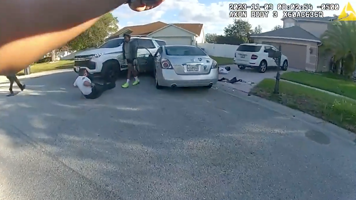 Florida cops on ground after getting hit by car
