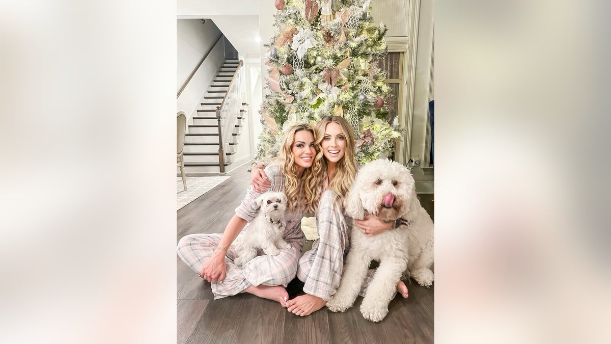 Ashley Baustert, Madi Brooks' mom, with her best friend, Jenny Reimold, after they decorated the Christmas tree in honor of Madison Brooks