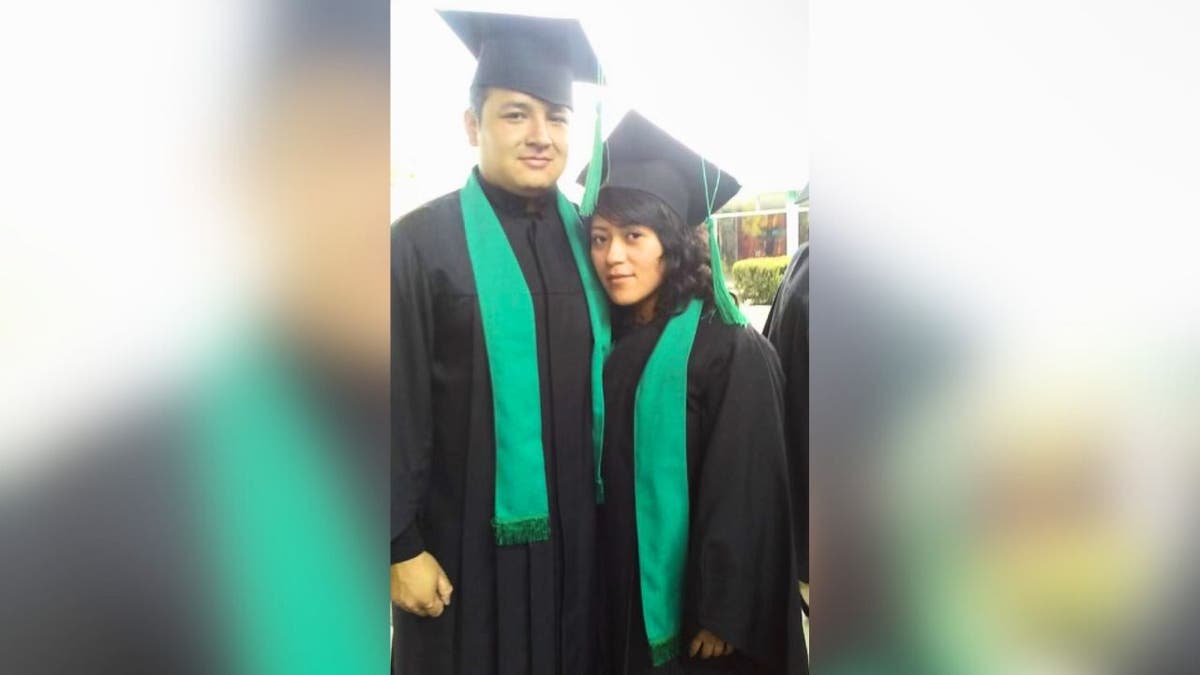 Juan Luis Gomez-Ramirez and Sarahi Lopez graduating.