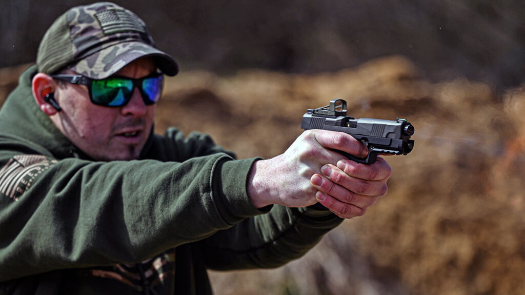 The author shooting the Daniel Defense H9.