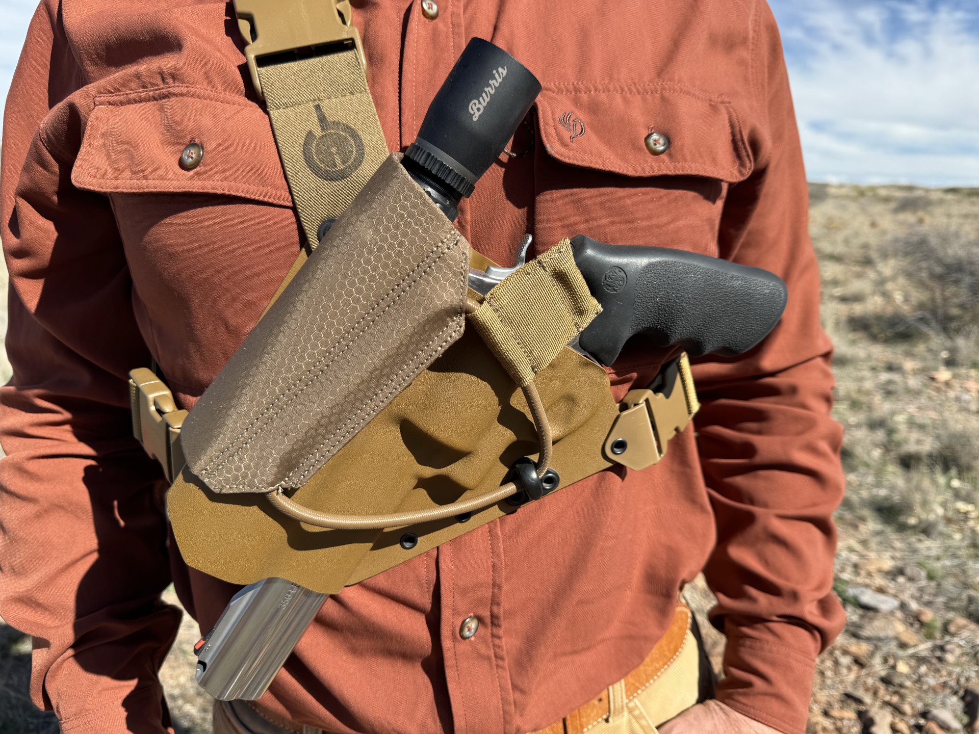 Gunfighters Inc's Kenai Scoped Hunter chest rig is an excellent holster for the field.