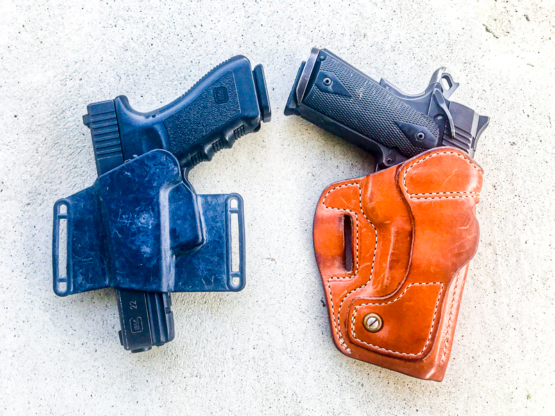 Two pistols in ambidextrous holster