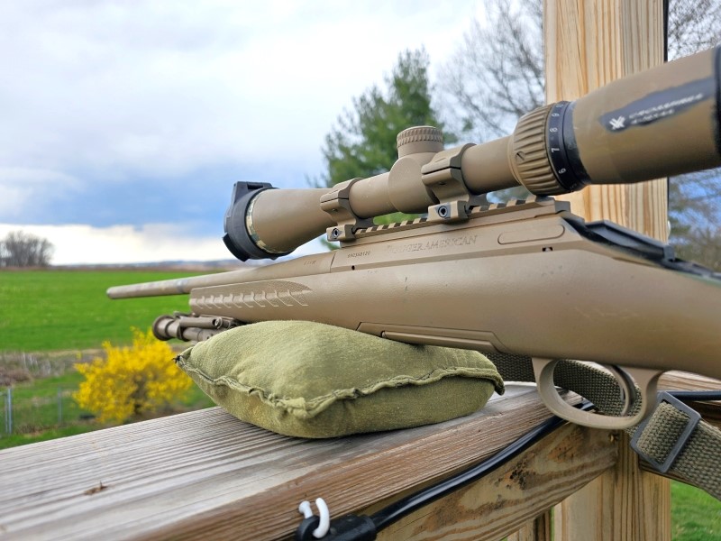 Ruger American Predator rifle supported by a sandbag.