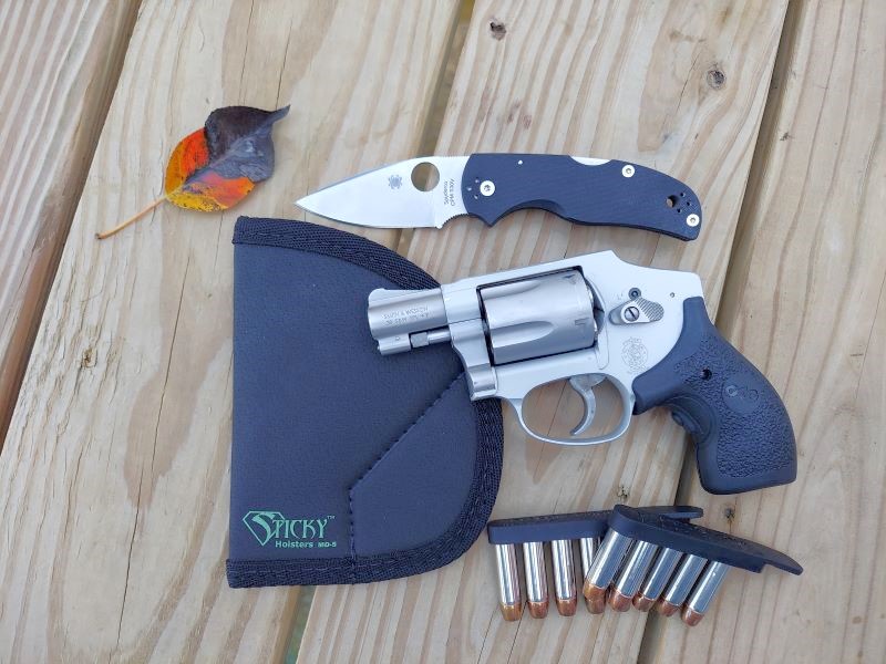 S&W 642 .38 Special Airweight, speed strips, Sticky holster, and Spyderco Native.