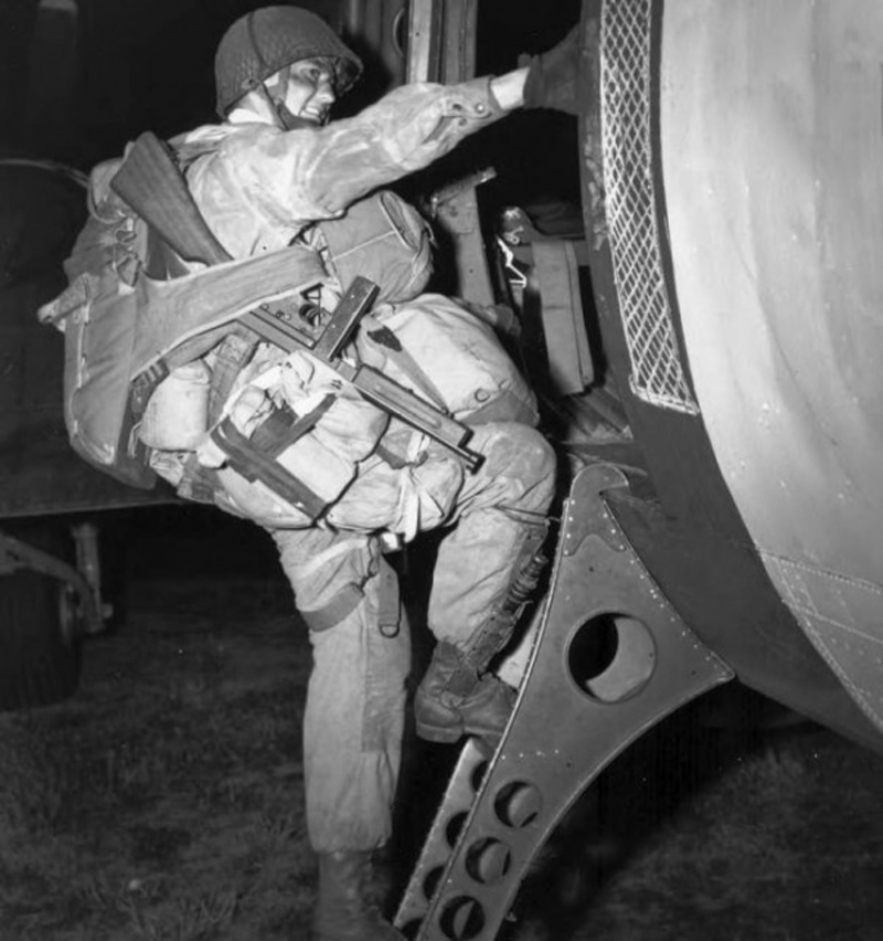 American paratrooper boarding a plane for Normandy
