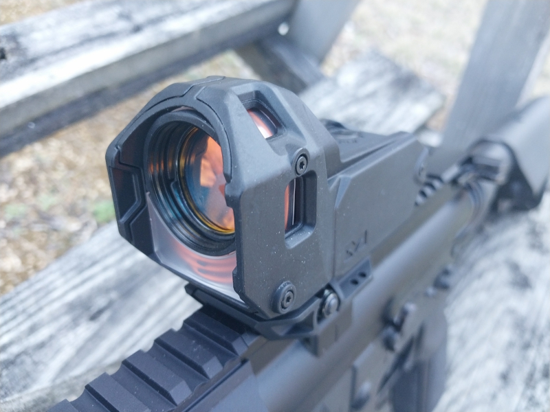Meprolight M22 Self-Illuminated Reflex Sight on a rifle