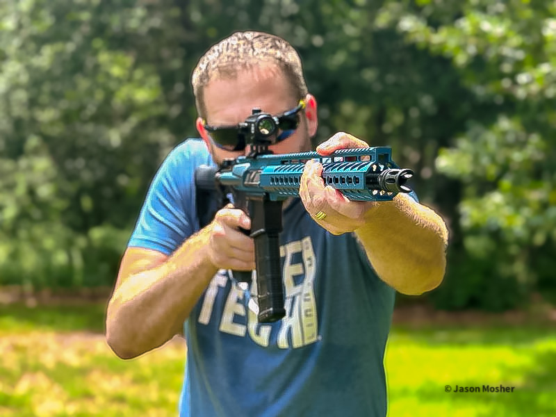 Shooting the AR-15 a forward grip.