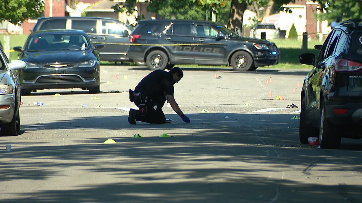 Detroit police officer at crime scene