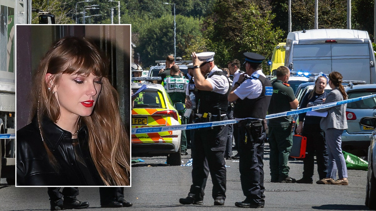 Police work at the scene in Southport, England, where a man has been detained and a knife has been seized after a number of people were injured in a reported stabbing on Monday, July 29.