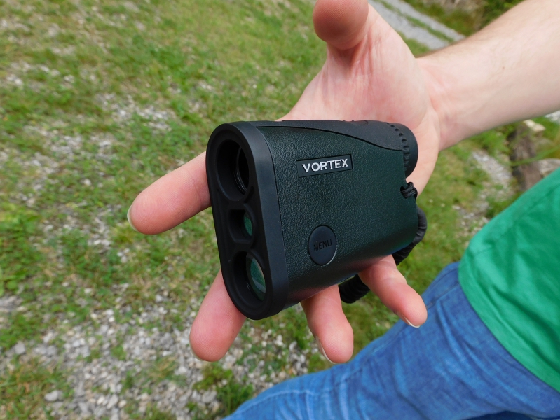 Man holding Vortex Crossfire HD 1400 Laser Rangefinder