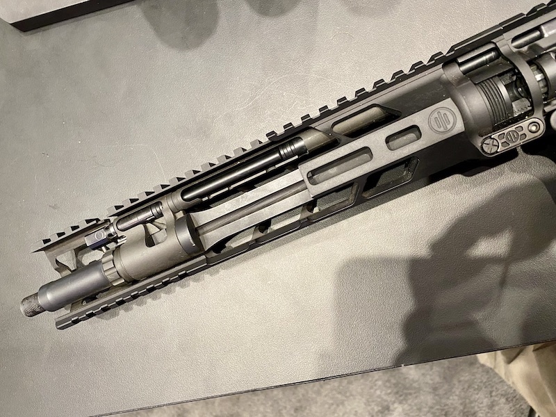 A cutaway showing how the PWS piston takes the place of the gas tube in an AR. This configuration keeps the gases out of the upper receiver--mostly.