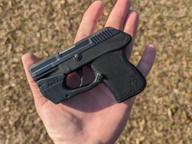 p32 in hand with laser