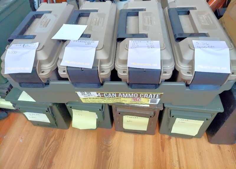 Military and civilian ammo cans with labels.