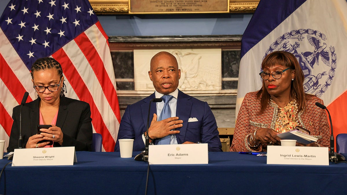 Mayor Eric Adams flanked by his Deputy Mayor Sheena Wright (L) and Ingrid Lewis-Martin are pictured during his weekly in person press conference at City Hall Blue Room. (Luiz C. Ribeiro/New York Daily News/Tribune News Service via Getty Images)