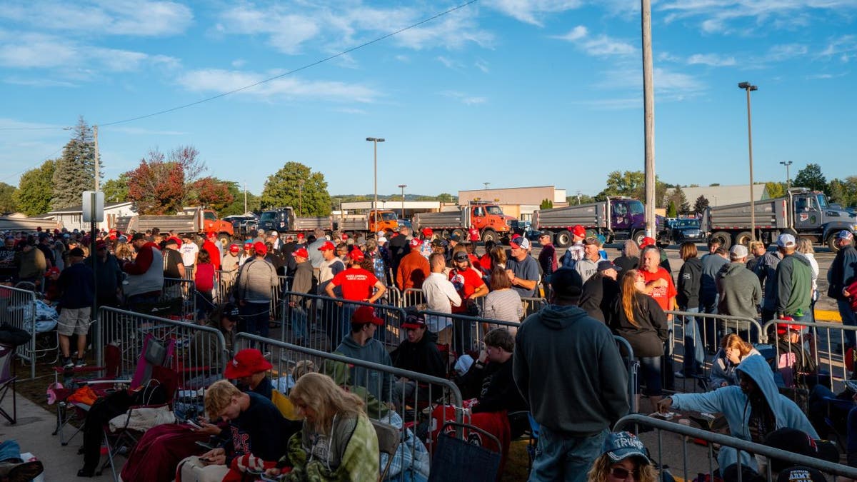 Supporters outside rally