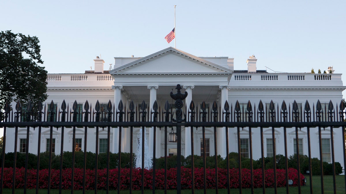 The White House with the flag at half-staff on 9/11