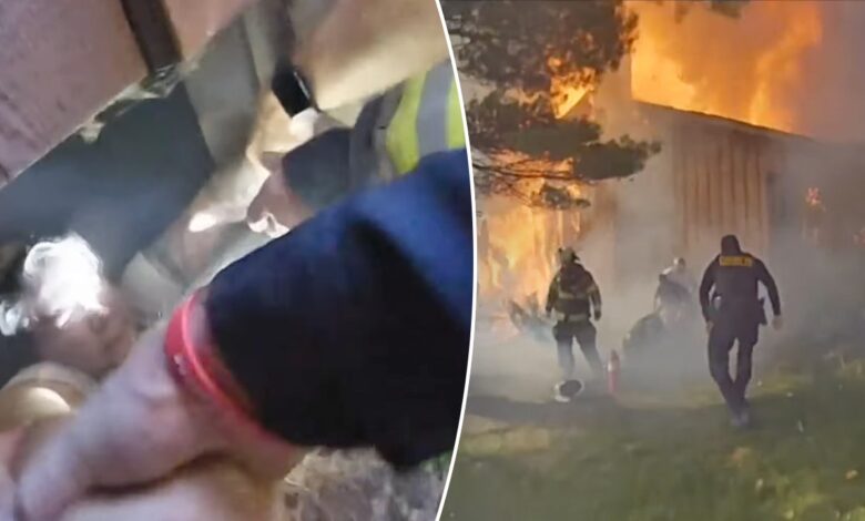 Ohio woman pulled to safety from basement while home above her engulfed in flames, bodycam shows