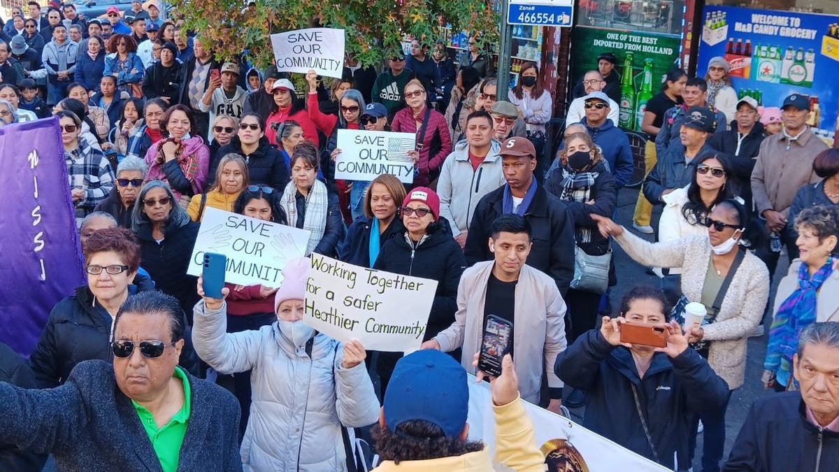 Protesters holding signs against prostitution