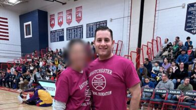 Athletic director at suburban high school arrested in alleged sextortion scheme