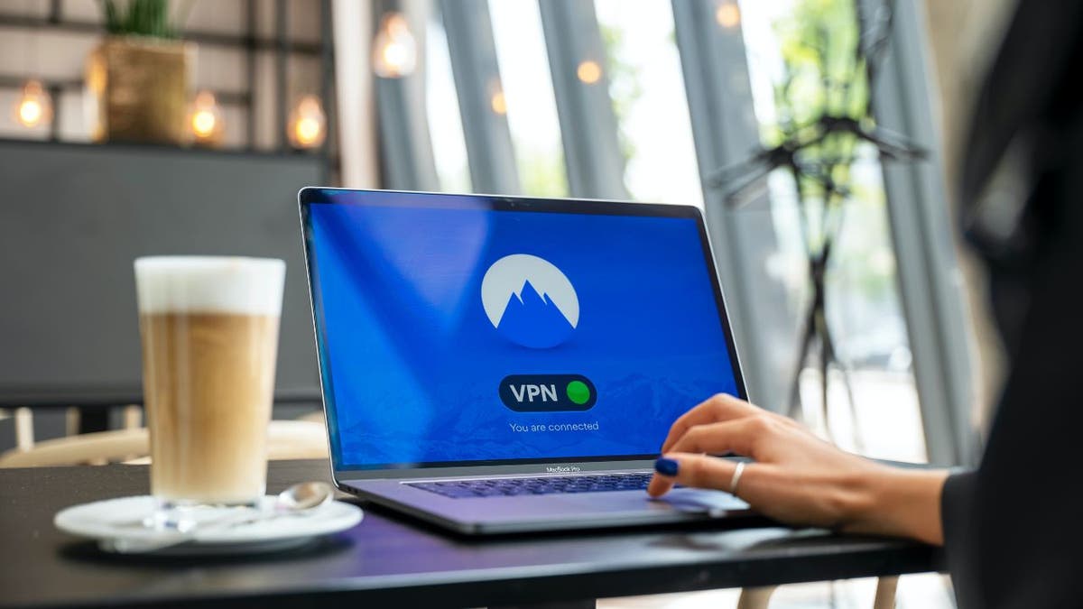 woman using vpn on laptop