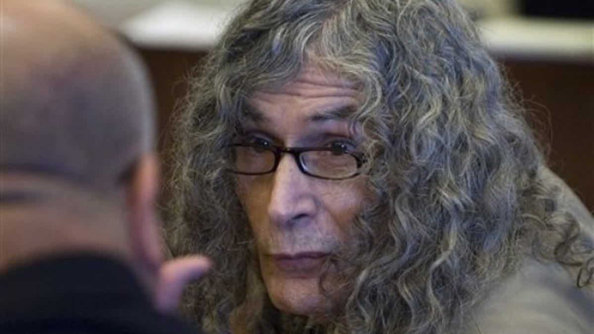 Rodney Alcala talks with his investigator before being convicted in Santa Ana, Calif. on Feb. 25, 2010, of murdering a 12-year-old girl and four women in the late 1970s (AP).