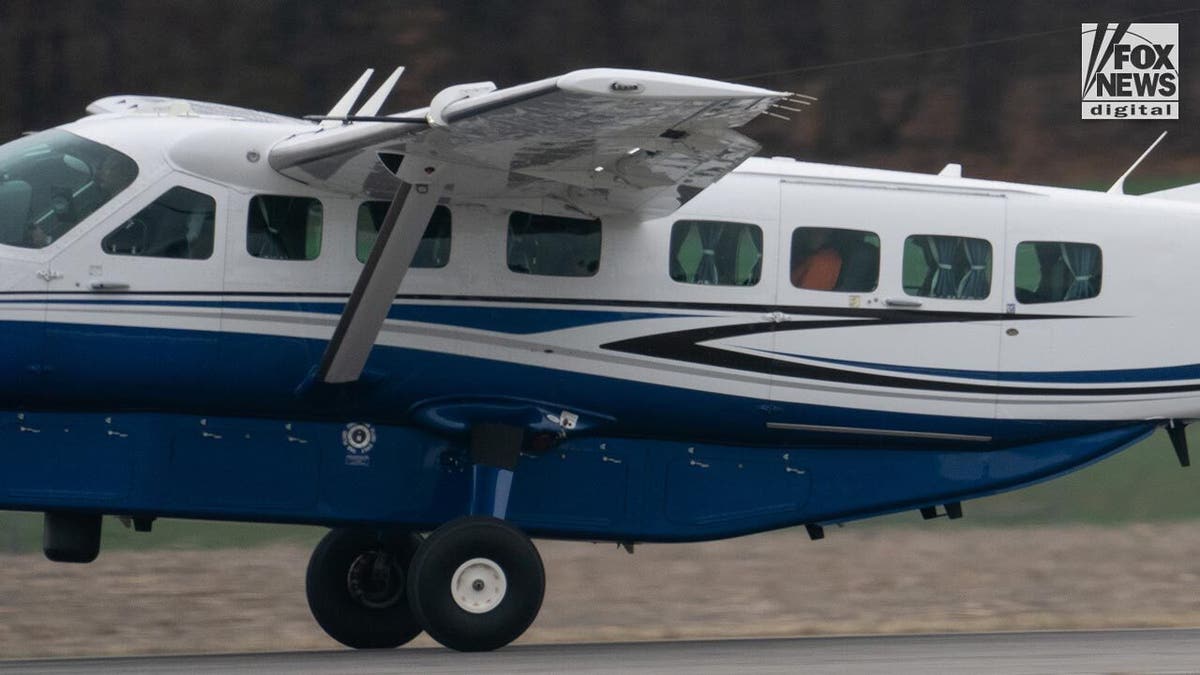 Luigi Mangione on a flight from Pennsylvania to New York on Dec. 19 after waiving extradition.