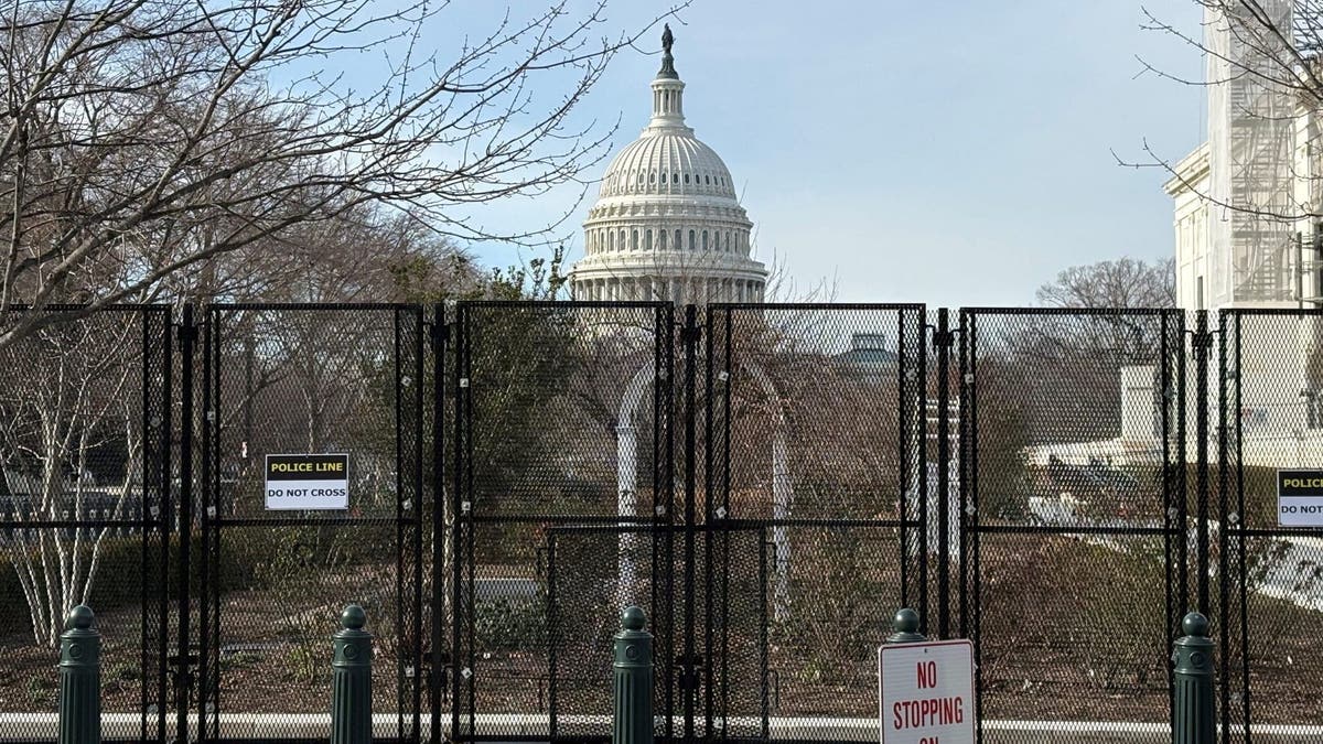 US Capitol Building surrounded by fence