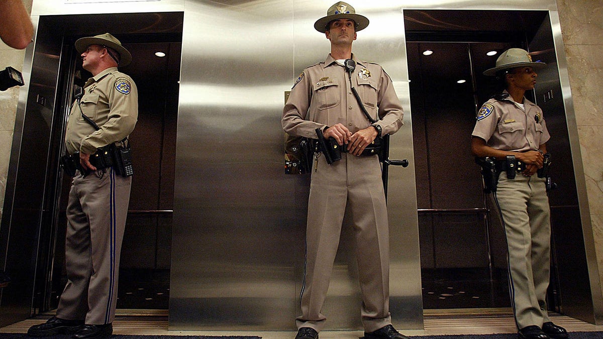 CHP officers in a courthouse