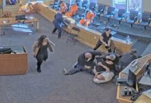 Video captures courtroom brawl as two men attack murder suspect during hearing