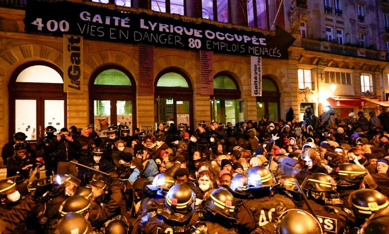 Hundreds of migrants evicted from Paris theater after squatting there for months