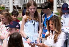 First lady Melania Trump welcomes children to White House for work day celebration