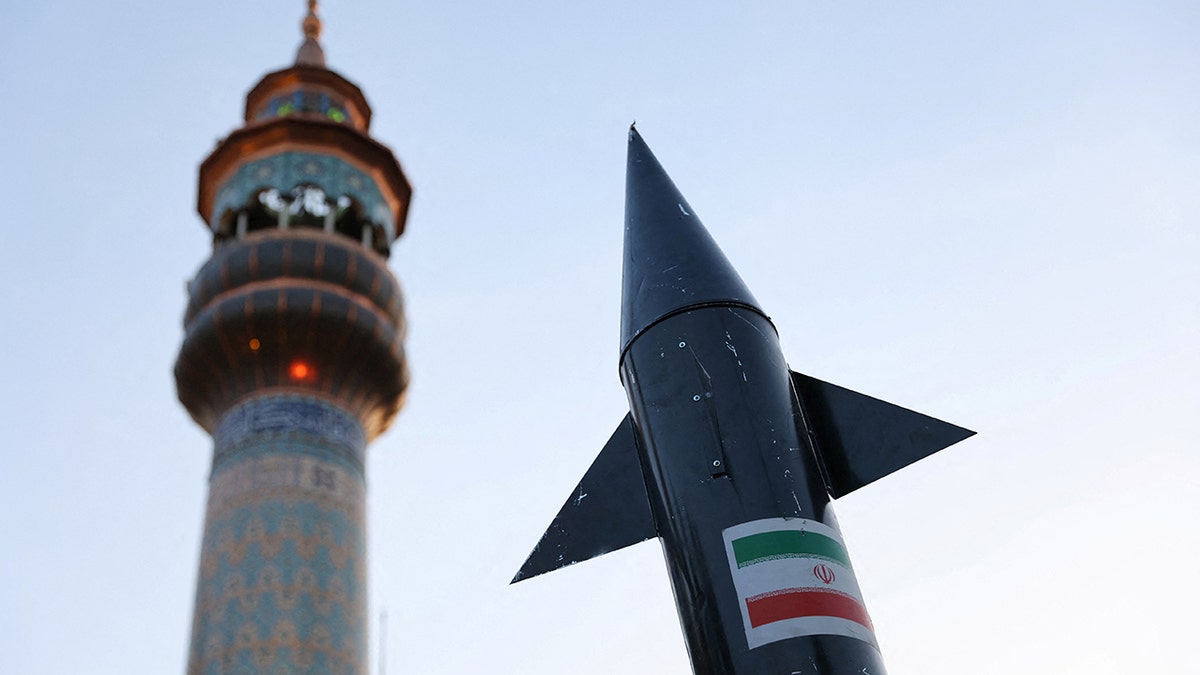 A model of a missile is seen during a celebration following the IRGC attack on Israel, in Tehran, Iran, April 15, 2024.