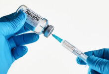 The Great Vaccine Debate: Unmasking America’s Aggressive COVID-19 Booster Policy