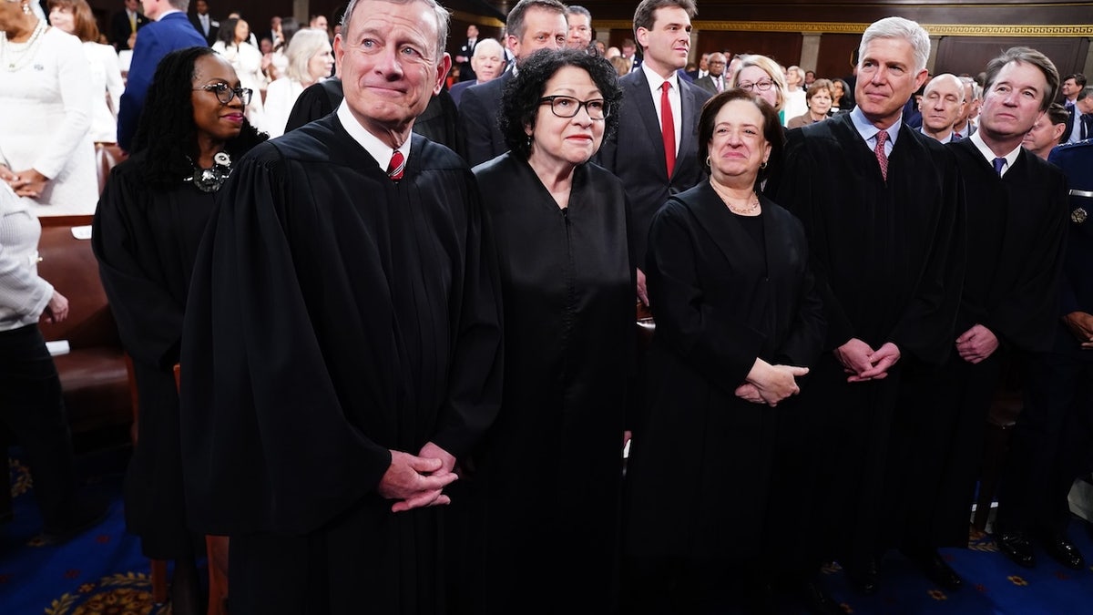WASHINGTON, DC - MARCH 7: U.S. Supreme Court Chief Justice John Roberts (L) and Associate Justices (L-R) Sonia Sotomayor, Elena Kagan, Neil Gorsuch and Brett Kavanaugh stand on the House floor ahead of the annual State of the Union address by U.S. President Joe Biden before a joint session of Congress at the Capital building on March 7, 2024 in Washington, DC. This is Biden's final address before the November general election. (Photo by Shawn Thew-Pool/Getty Images)