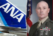 Marine restrains man allegedly trying to open plane’s emergency exit during flight