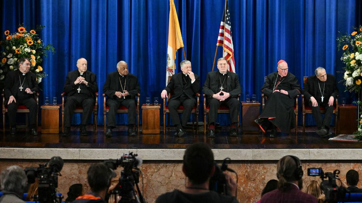 The clergymen on stage at the U.S. Conference of Catholic Bishops