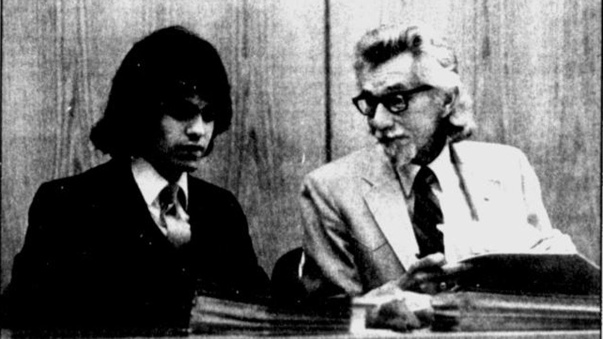 A black and white photo of Leo Schofield in court.