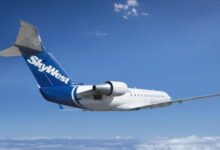 SkyWest flight diverted after passenger tries to open emergency door, fights with flight attendant: report
