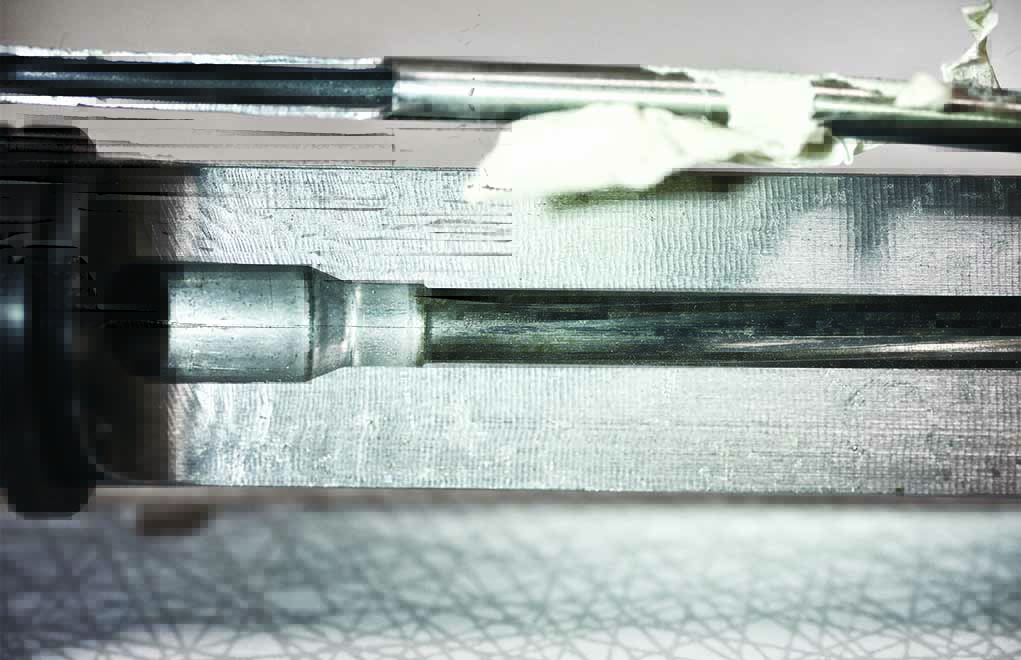The leade is the distance forward of the case neck before the start of the rifling. The longer it is, the less the peak pressure.