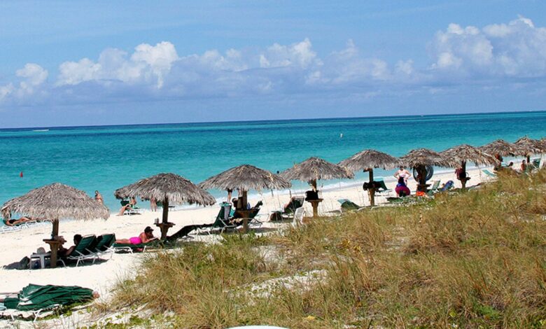 Caribbean police work to ID body found during search for missing American as nearby security guard was killed Caribbean police work to ID body found during search for missing American as nearby security guard was killed