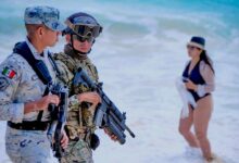 Americans in vacation hot spot may see more military than margaritas this summer