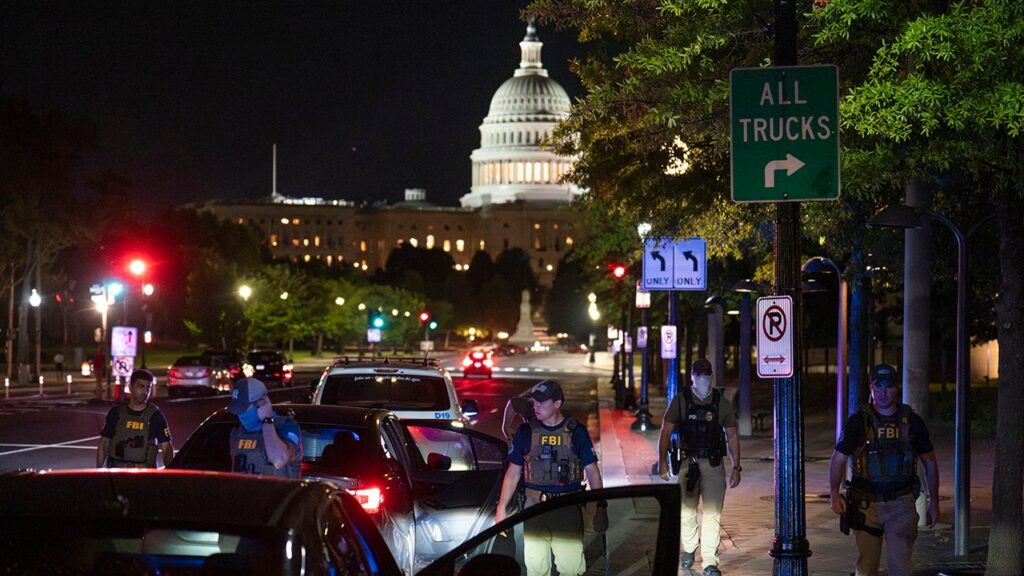 Protesters confront officers patrolling DC streets after Trump policing takeover