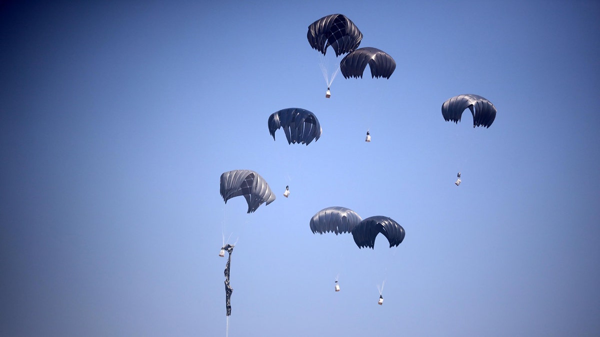 Jordanian and UAE planes drop humanitarian aid into the Gaza Strip on July. 27