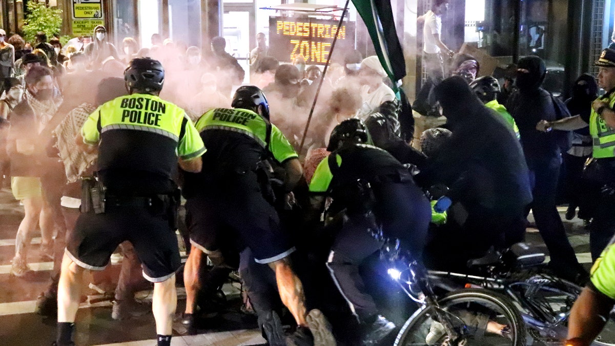 Boston police respond to a protest