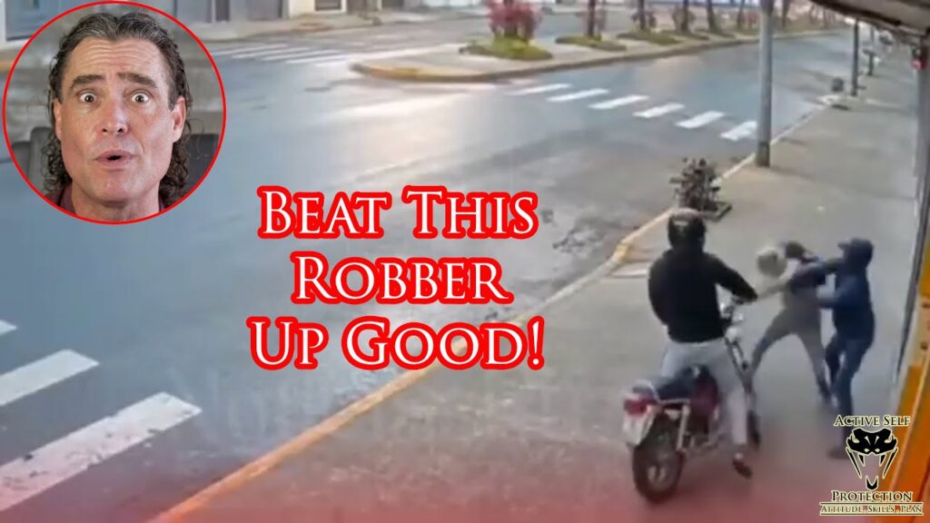 Amazing Defender Puts a Beating on Surprised Robber