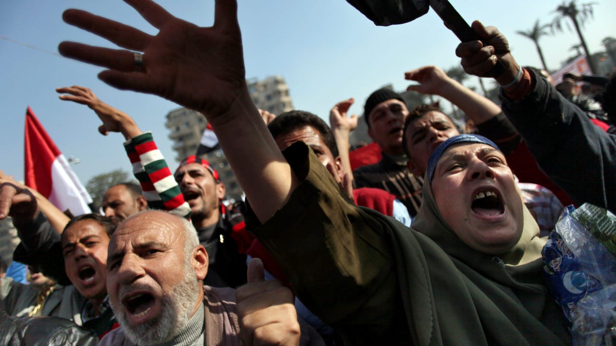 Nov. 30, 2012 - Egyptian protesters chant anti-Muslim Brotherhood slogans as they attend a rally in Tahrir Square, in Cairo, Egypt.