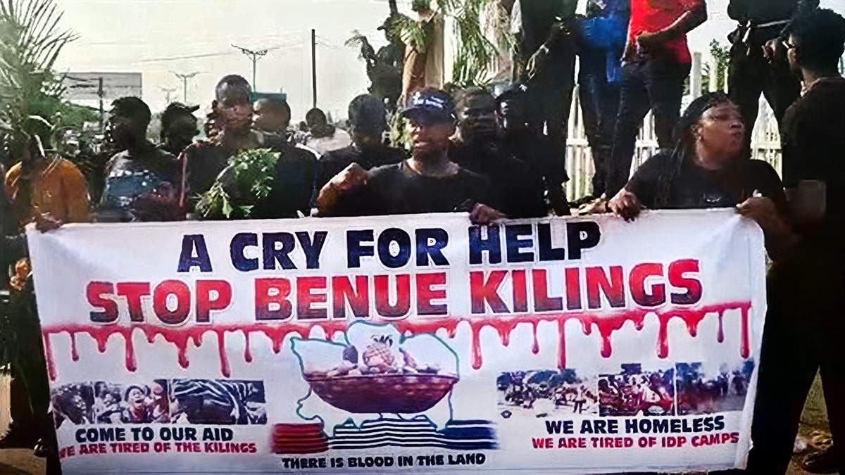 Young Nigerians protest the killings against Christians in Benue state.