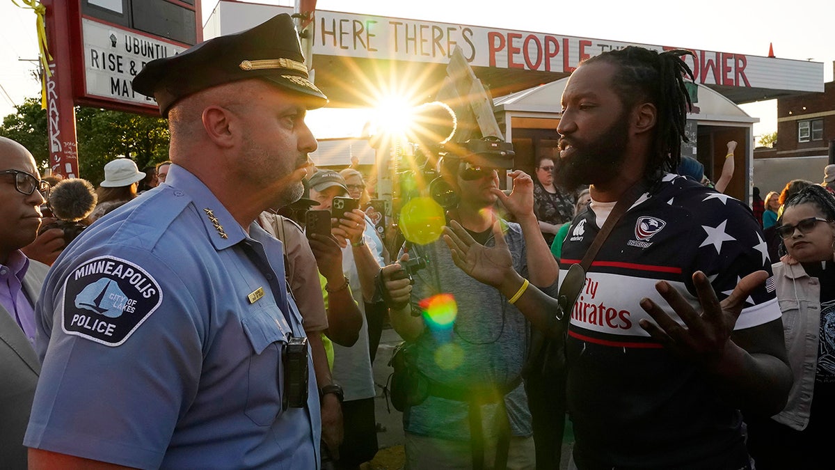 Minneapolis police officer and protester