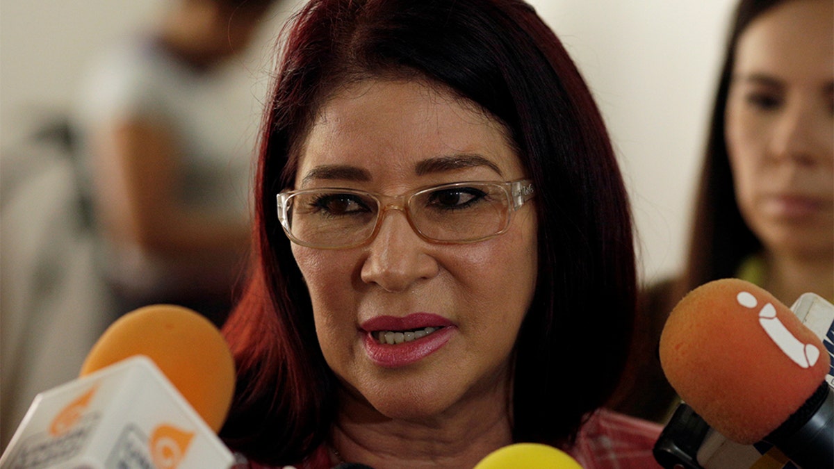 Cilia Flores, wife of Venezuela's President Nicolas Maduro, talks to the media during a simulation of the government's official July 30 vote for a new assembly, in Caracas, Venezuela July 16, 2017.  Marco Bello/ Reuters